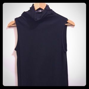 Black sleeveless turtleneck
